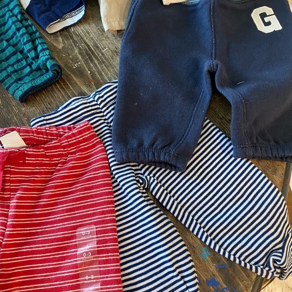 13 pairs of baby BOY pants! Leggings, jeans khaki's & one pair of shorts 💙🤍💙 - Picture 5 of 7